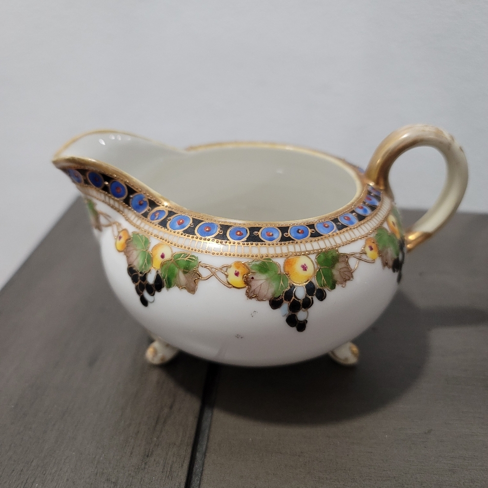 Nippon hand painted sugar bowl and creamer set